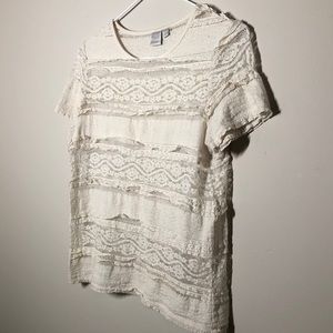 Cream coloured, lace shirt